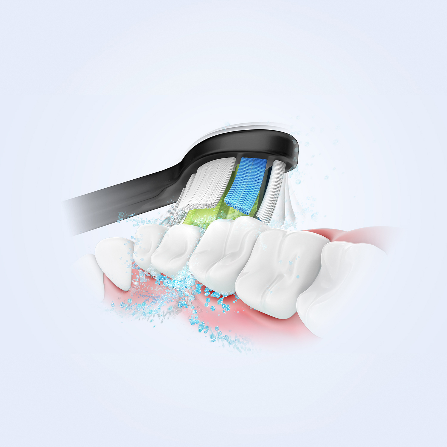 Close-up of an electric toothbrush cleaning teeth. White teeth, blue and green bristles.