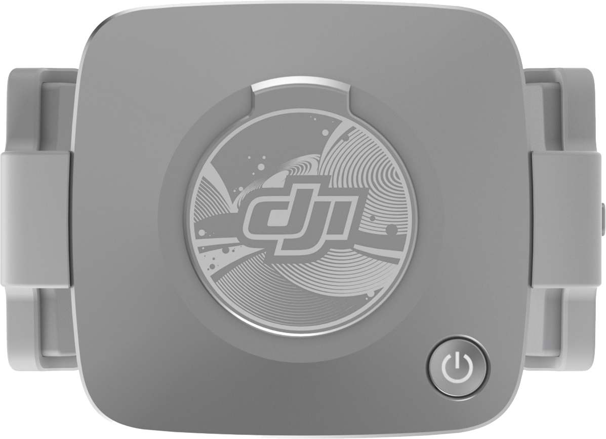 Grijs DJI-apparaat met een logo en een aan/uit-knop, van bovenaf gezien.