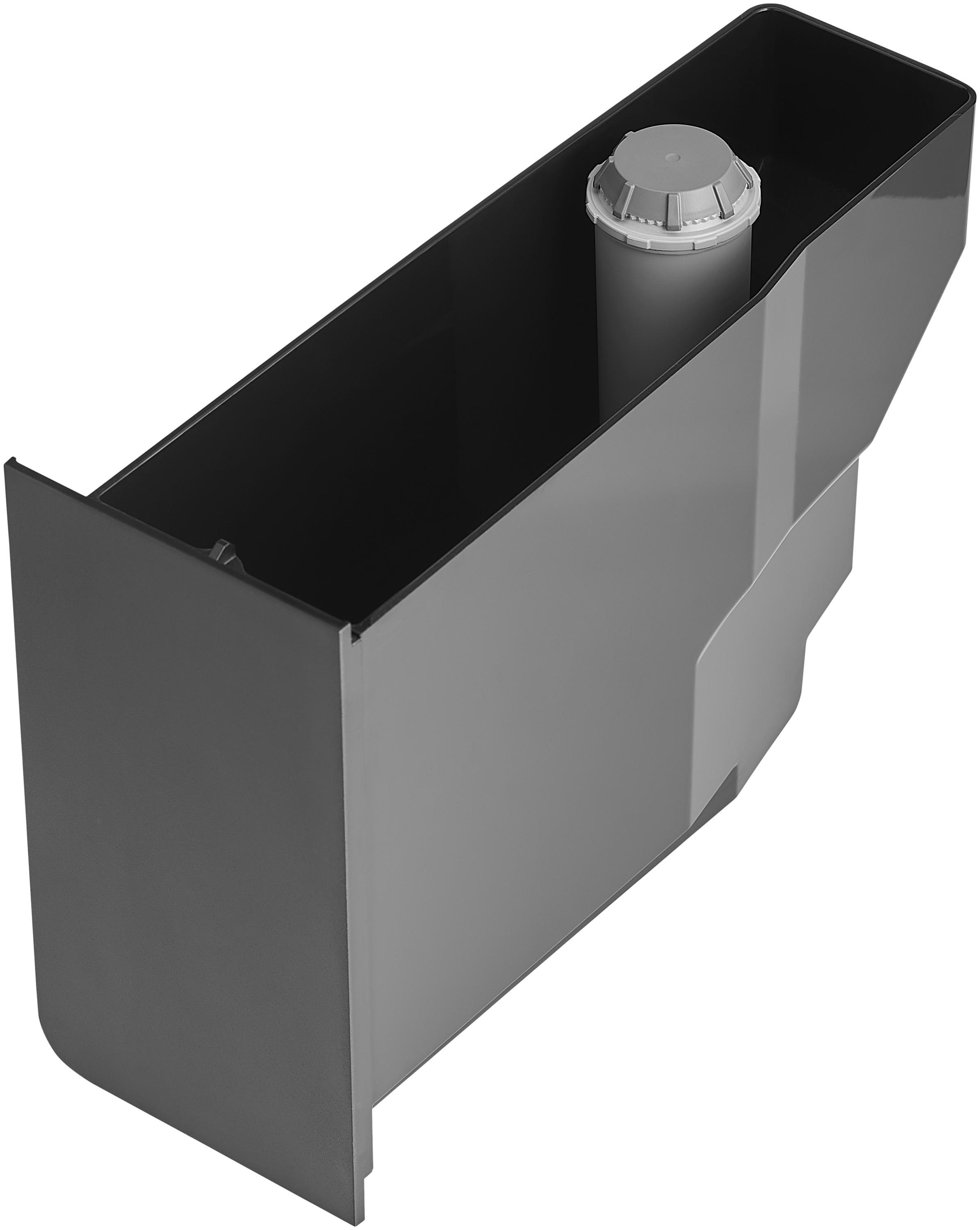 Ein grauer Wasserfilterbehälter, Draufsicht, mit Filterpatrone im Inneren.