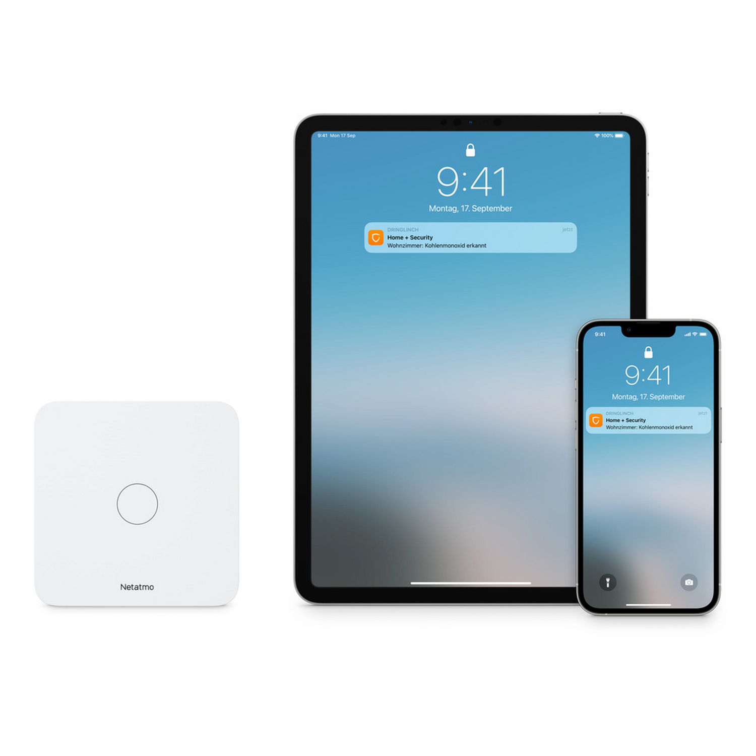 Una caja blanca, una tableta y un teléfono, todos mostrando la misma notificación de seguridad del hogar: monóxido de carbono detectado.