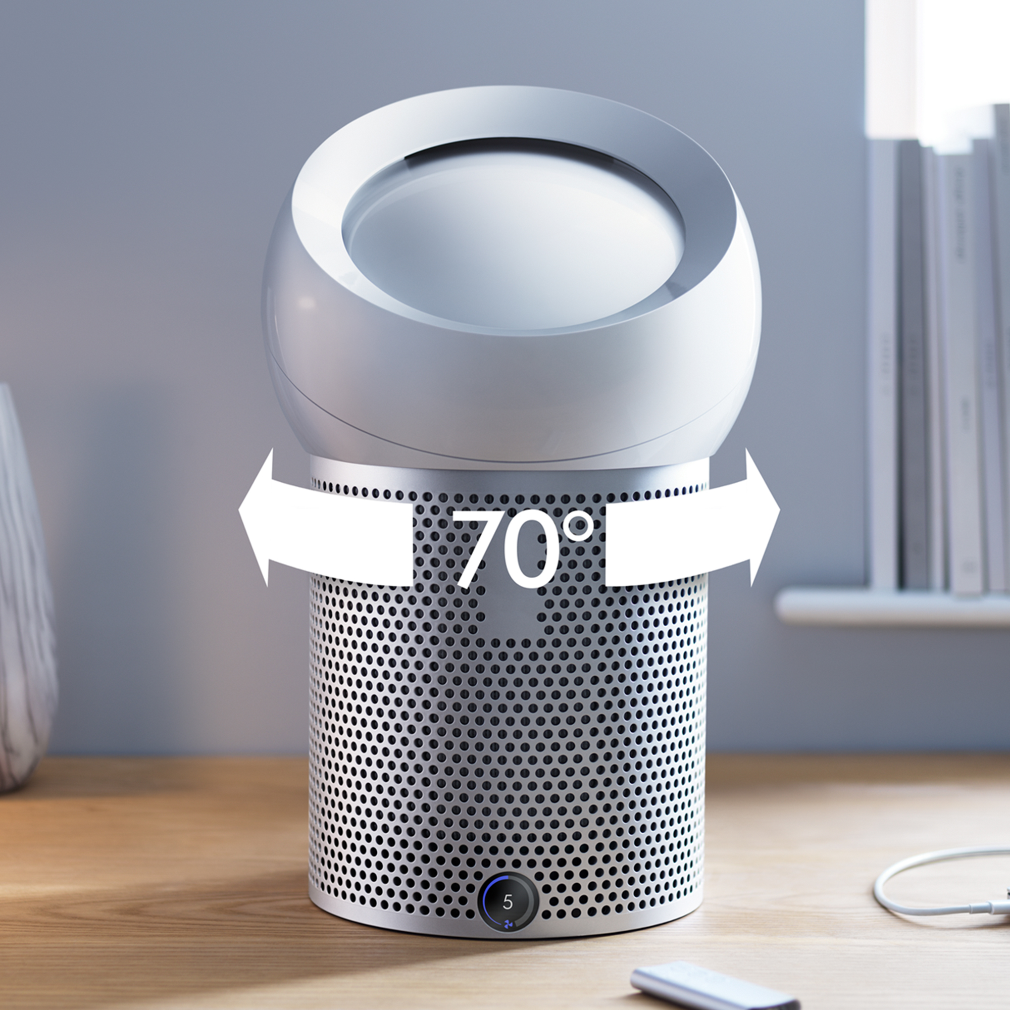 Un purificador de aire blanco con base plateada y parte superior giratoria, la parte superior muestra 70 grados de rotación.
