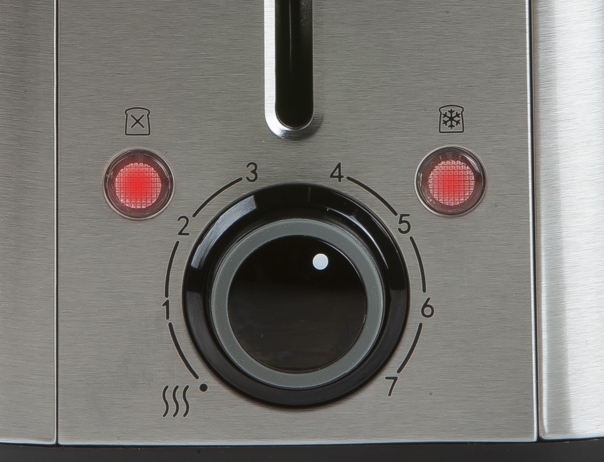 Close-up of a toaster control panel with a dial and buttons, showing different toasting settings.