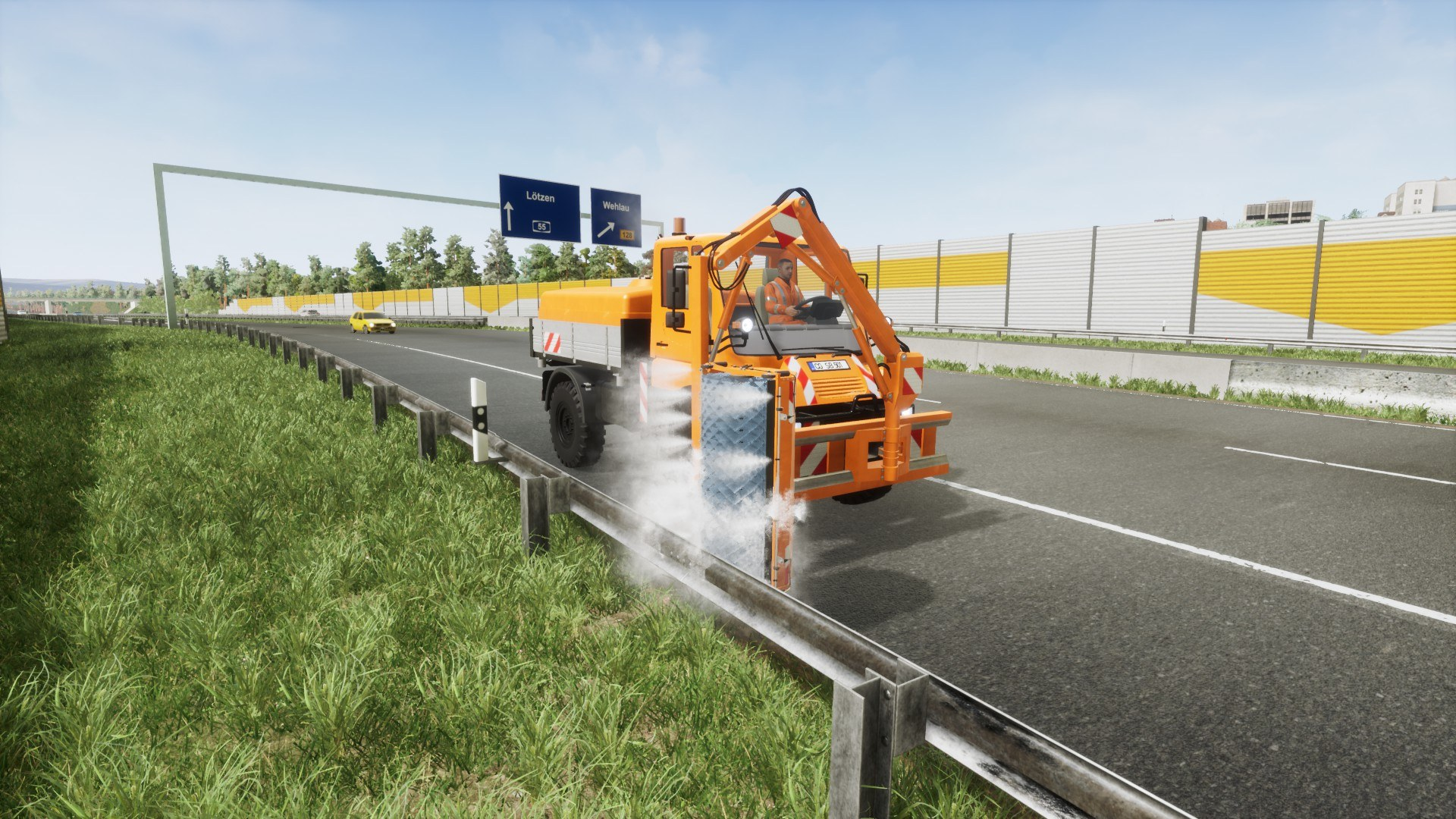Un veicolo arancione per la manutenzione stradale che spruzza acqua su una strada.