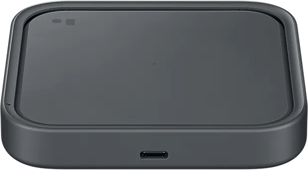 A square wireless charging pad. It's dark gray, with a USB-C port. The background is white.
