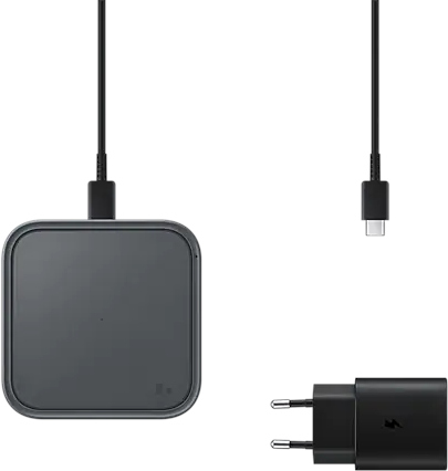 Black wireless charging pad with cable and power adapter. All items are black.