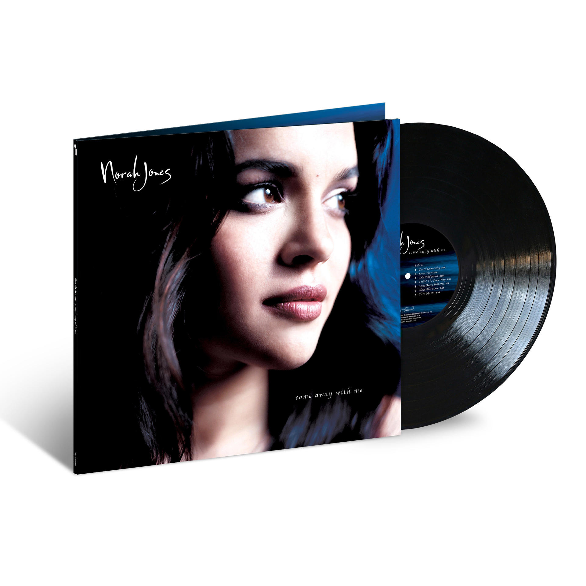 Ein Cover eines Norah Jones Albums ist geöffnet, mit einer Schallplatte daneben.