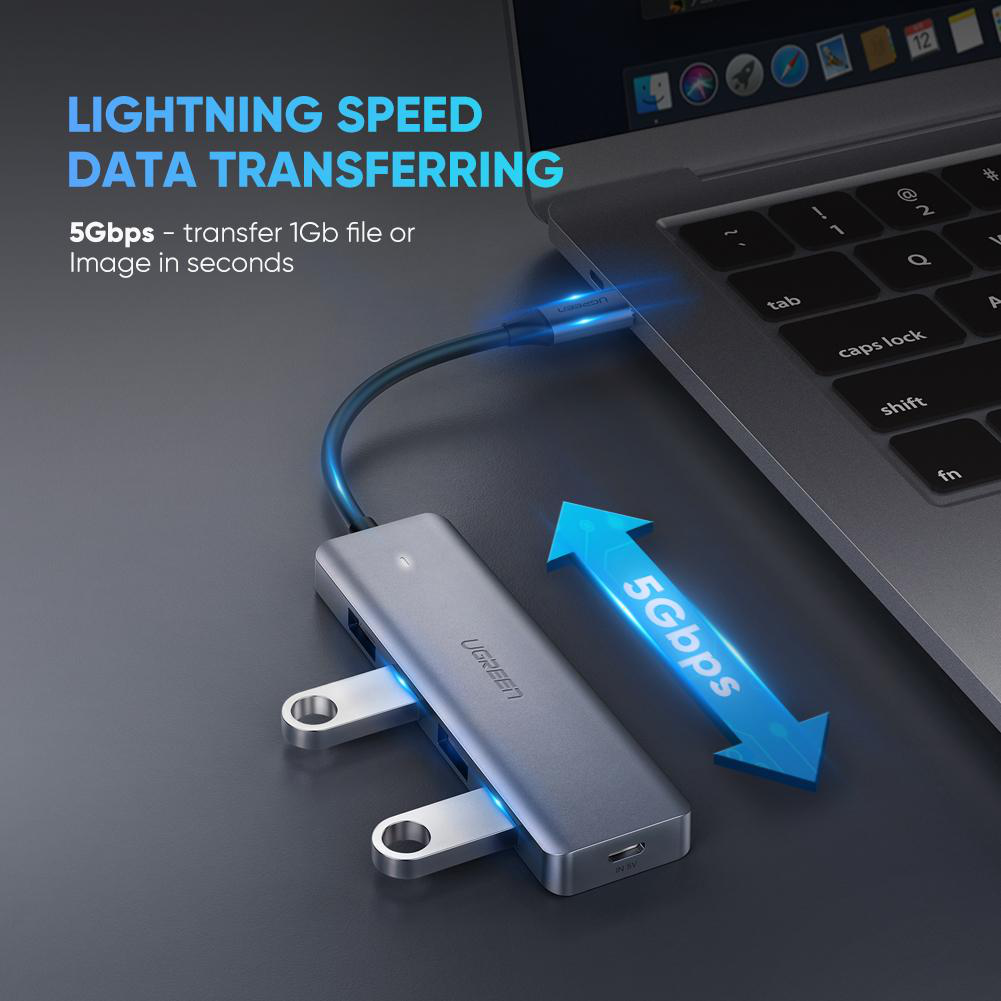 Hub USB avec un ordinateur portable. Texte : 'Transfert de données rapide'.