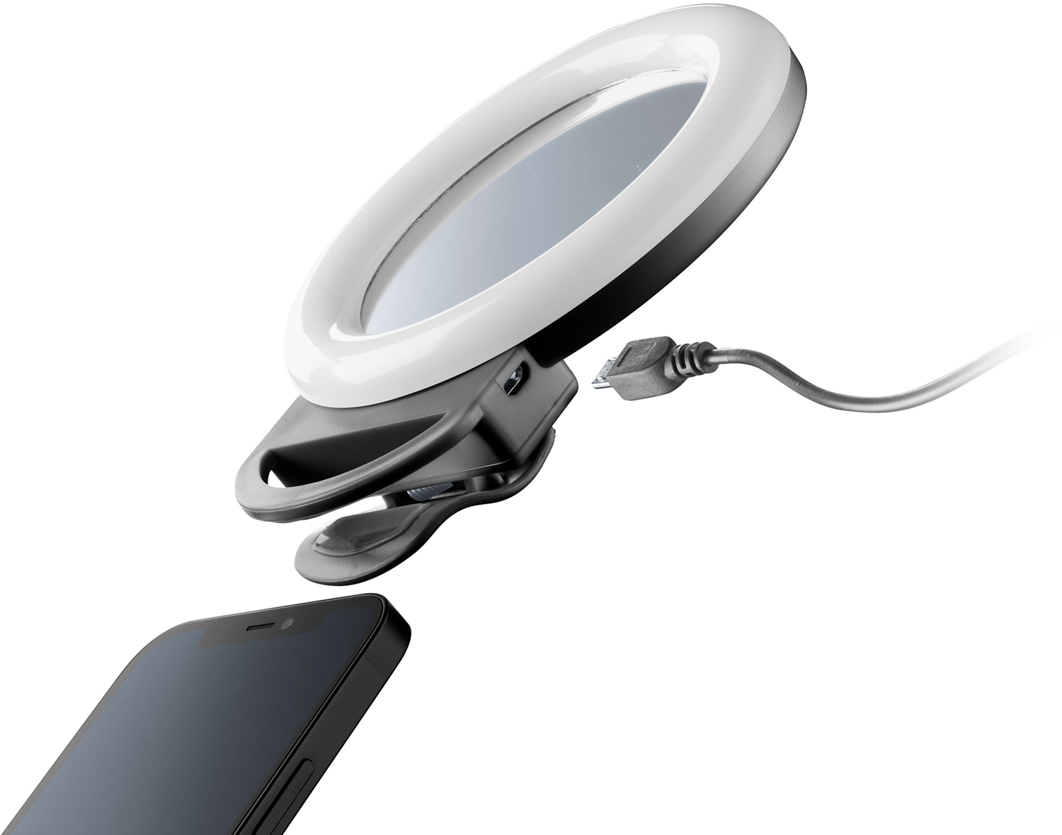 Une lampe annulaire avec un clip de téléphone fixé à un téléphone. La lumière est blanche avec un clip noir.