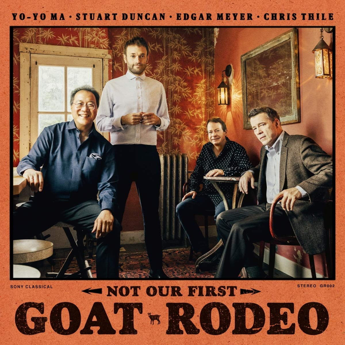 Négy férfi pózol egy szobában. Egy ül, kettő áll, egy ül. Az album címe a 'Goat Rodeo' alul található.