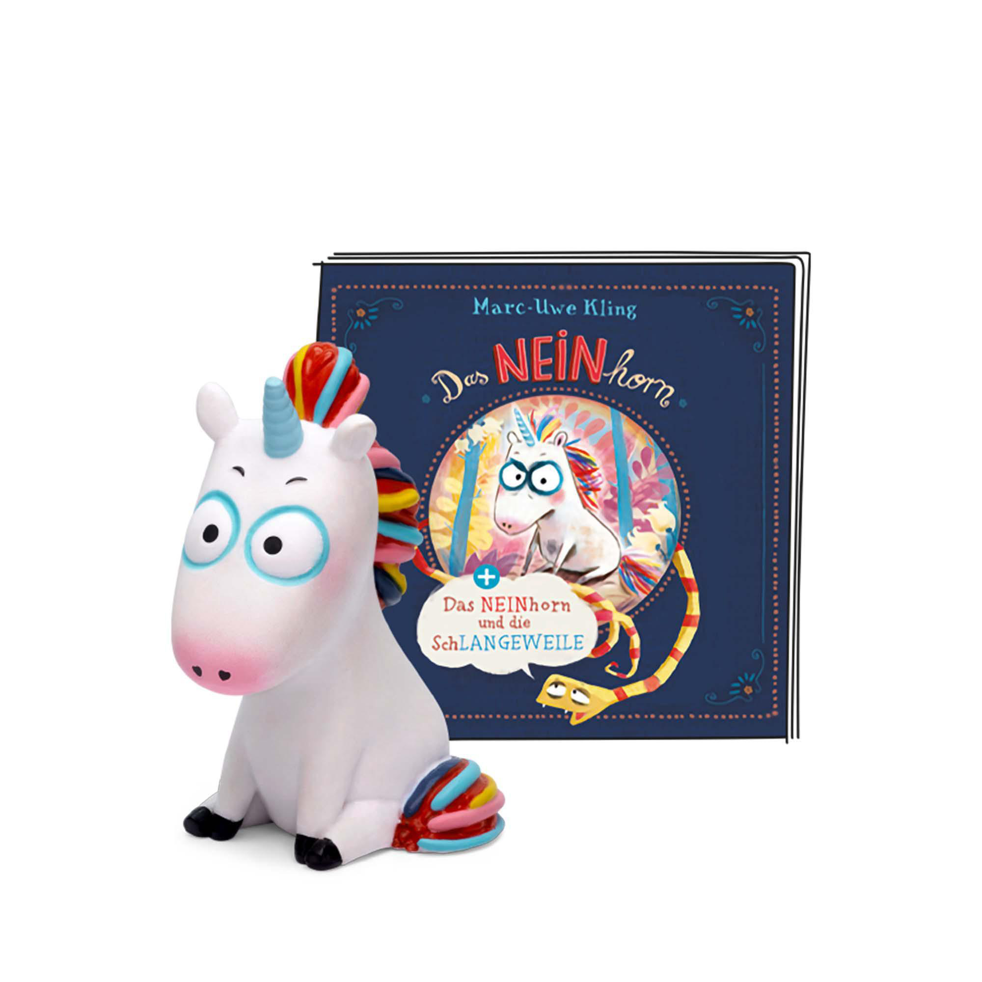 Eine Einhornfigur und ein Buch. Das Buchcover hat ein Cartoon-Einhorn und Text.