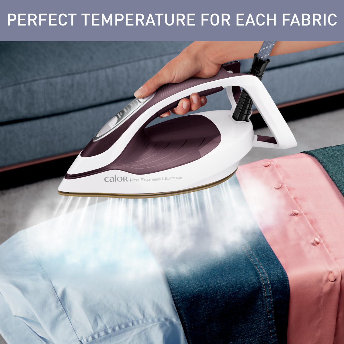 Ironing a shirt with a steam iron, with various colored shirts in the background. Text reads 'perfect temperature'.