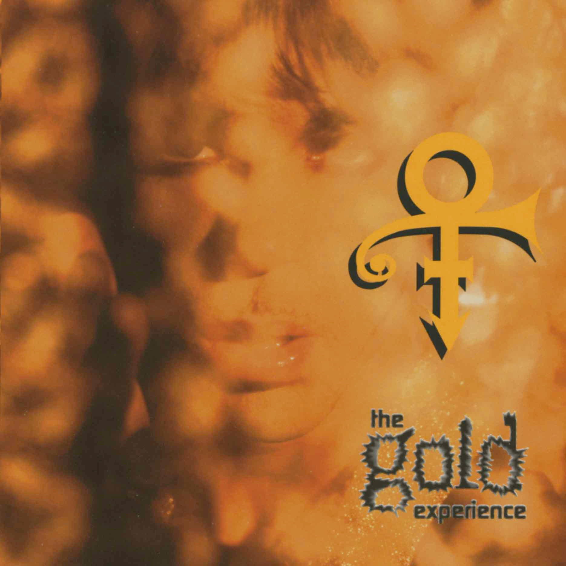 Albumcover für 'The Gold Experience' von Prince. Enthält ein verschwommenes Gesicht und Logo.
