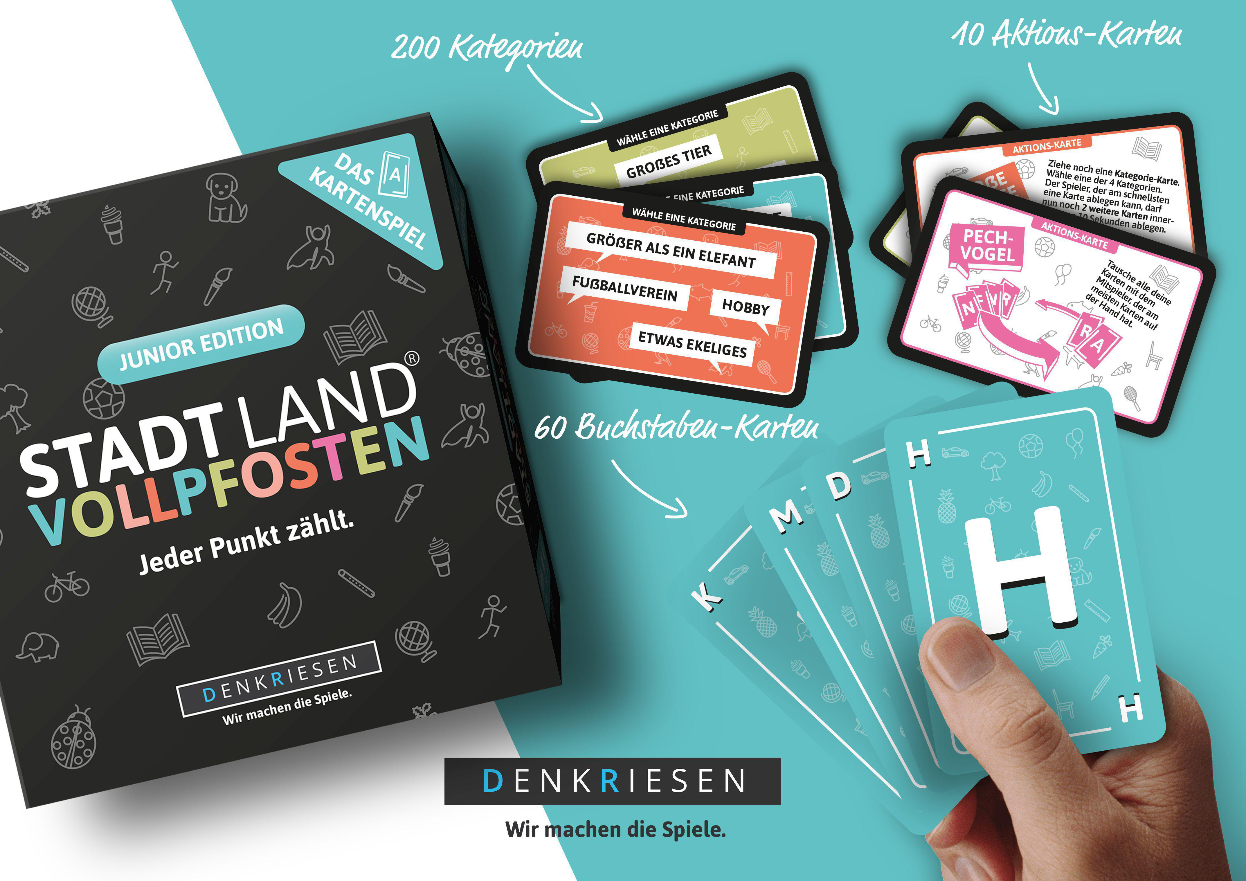 Ein Brettspiel-Setup mit Karten und Spielsteinen. Auf der Box steht Stadt Land Vollpfosten.