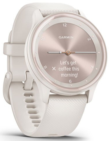 Montre connectée blanche avec cadran or rose. Elle affiche le message « Allons prendre un café ».