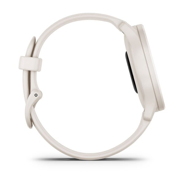Vue latérale d'une montre connectée crème avec cadran rond et bracelet.