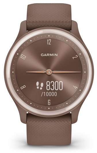 Une montre intelligente Garmin marron affiche l'heure et les pas. La montre a un bracelet marron.