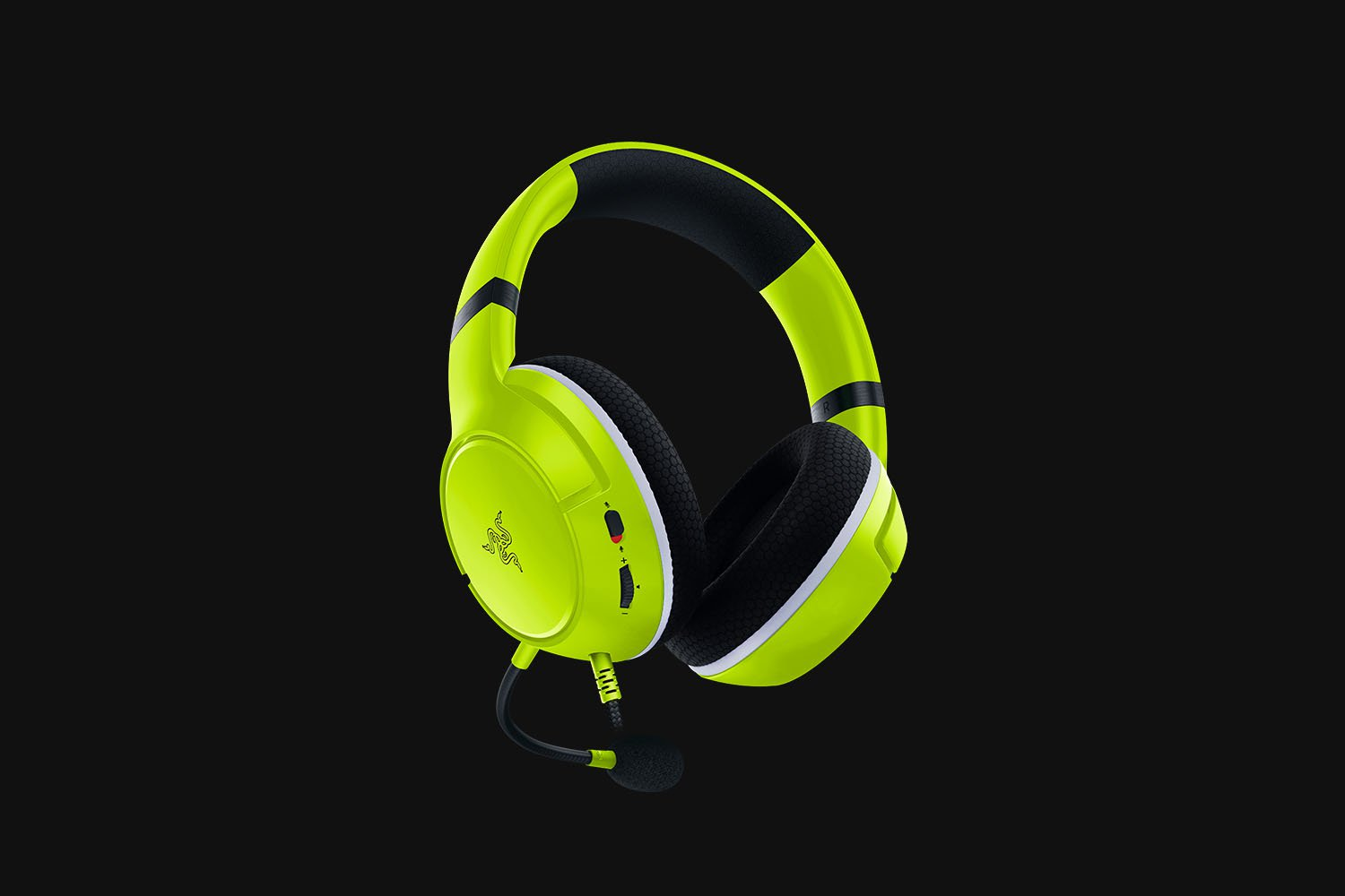 Lime green and black gaming headphones with a microphone. Black background.