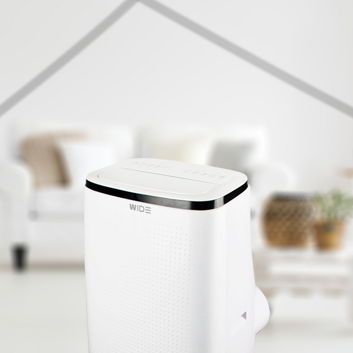 Purificador de aire blanco en una habitación con fondo blanco borroso.