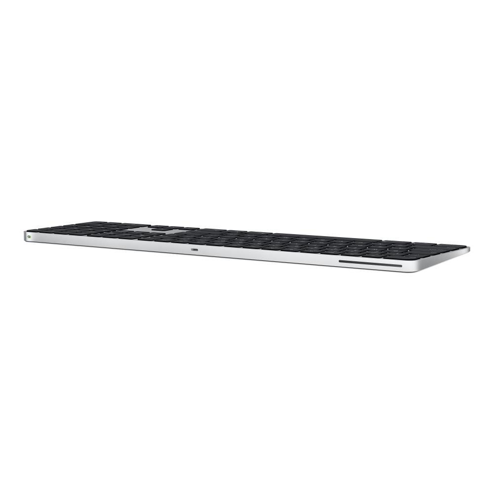 Eine silberne und schwarze Apple Magic Keyboard, flach auf einer weißen Oberfläche.