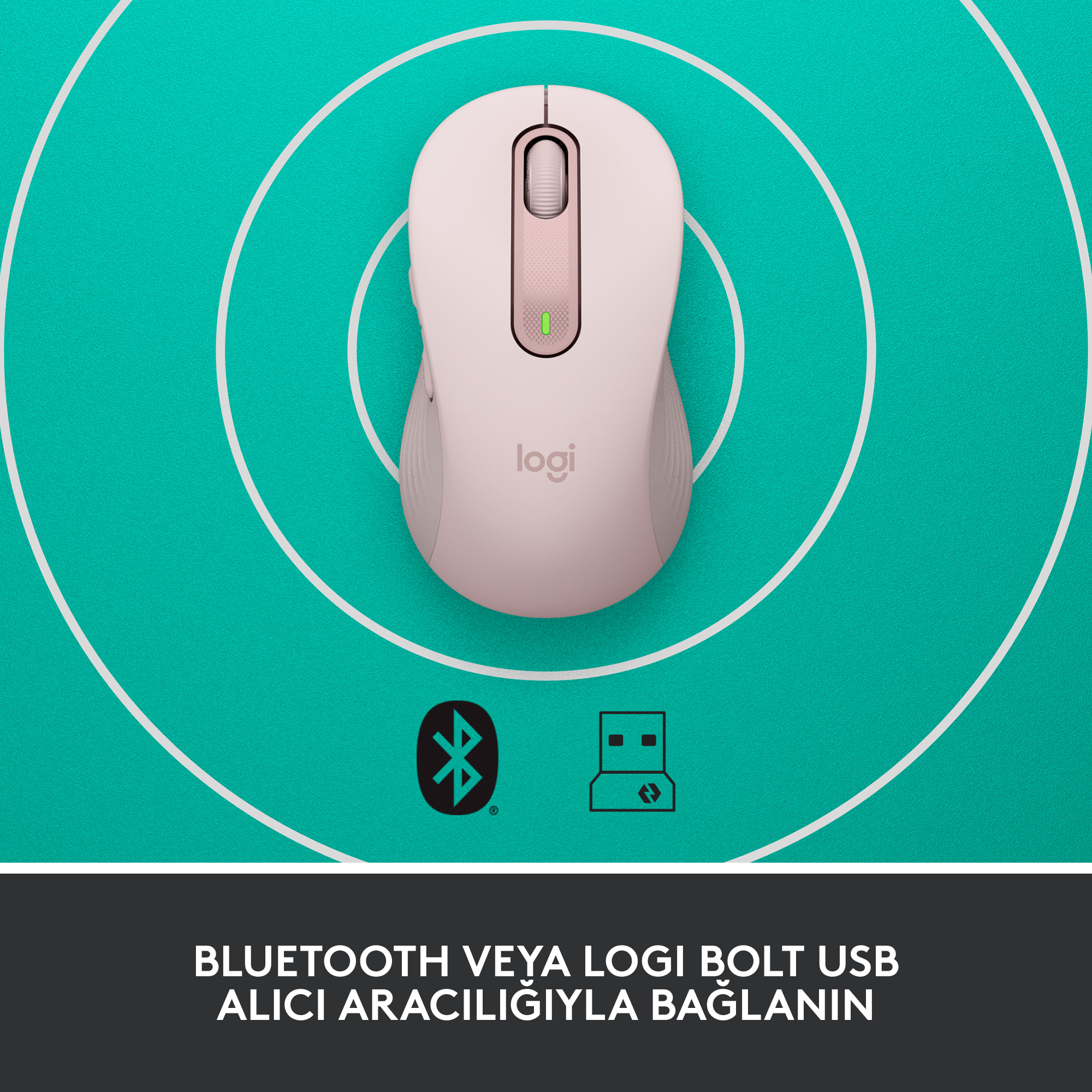 Bluetooth ve USB simgeleri olan pembe bilgisayar faresi. Fare, turkuaz desenli bir yüzeyde.