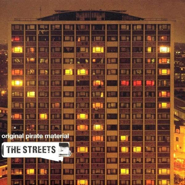 Hochhaus mit beleuchteten Fenstern bei Nacht. Albumcover: The Streets.