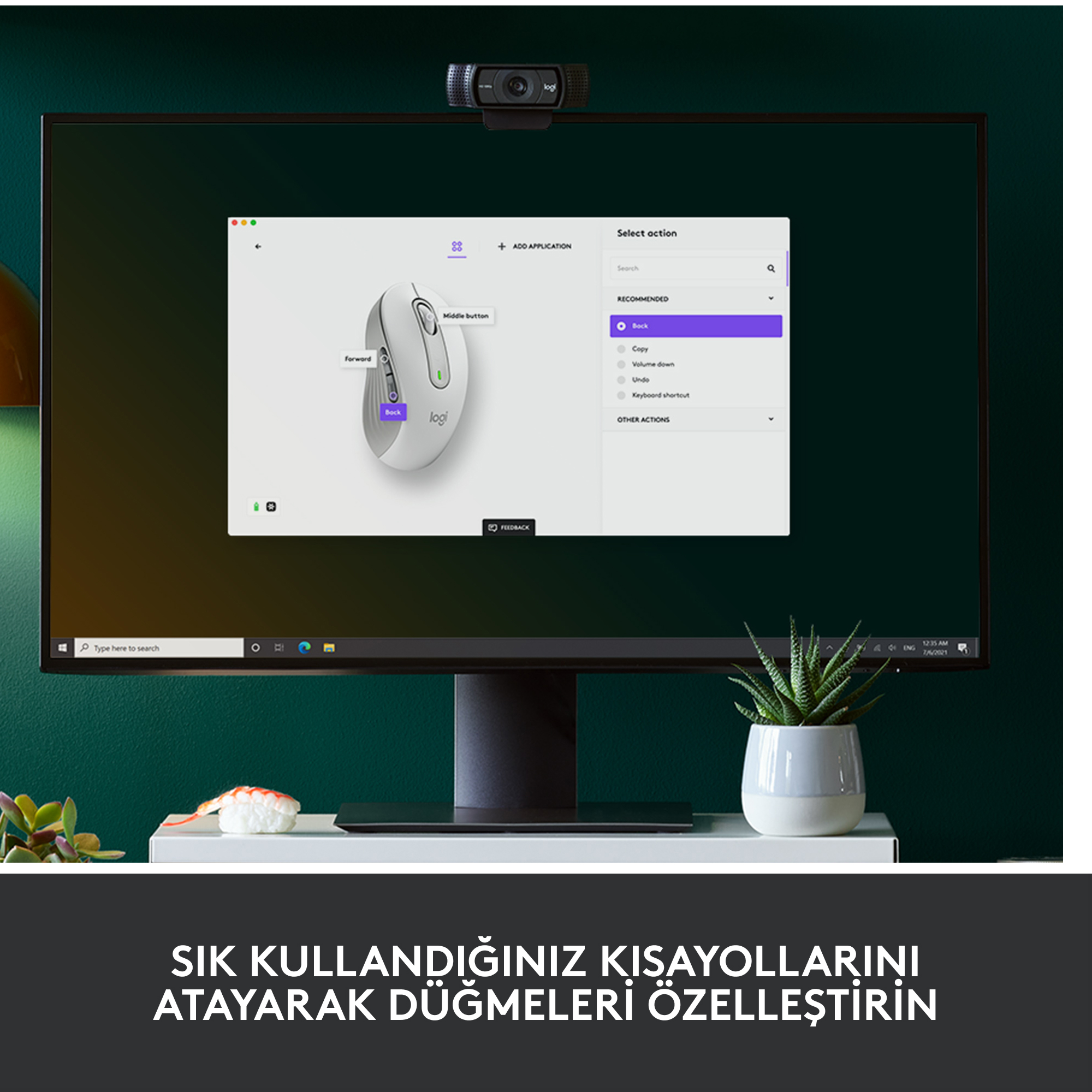 Üstte bir web kamerası bulunan bir bilgisayar monitörü. Ekran, bir fare ve uygulama seçeneklerini gösterir.