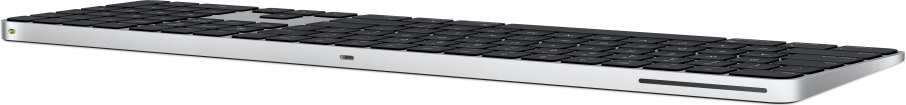Una Apple Magic Keyboard con cornice argentata e tasti neri.