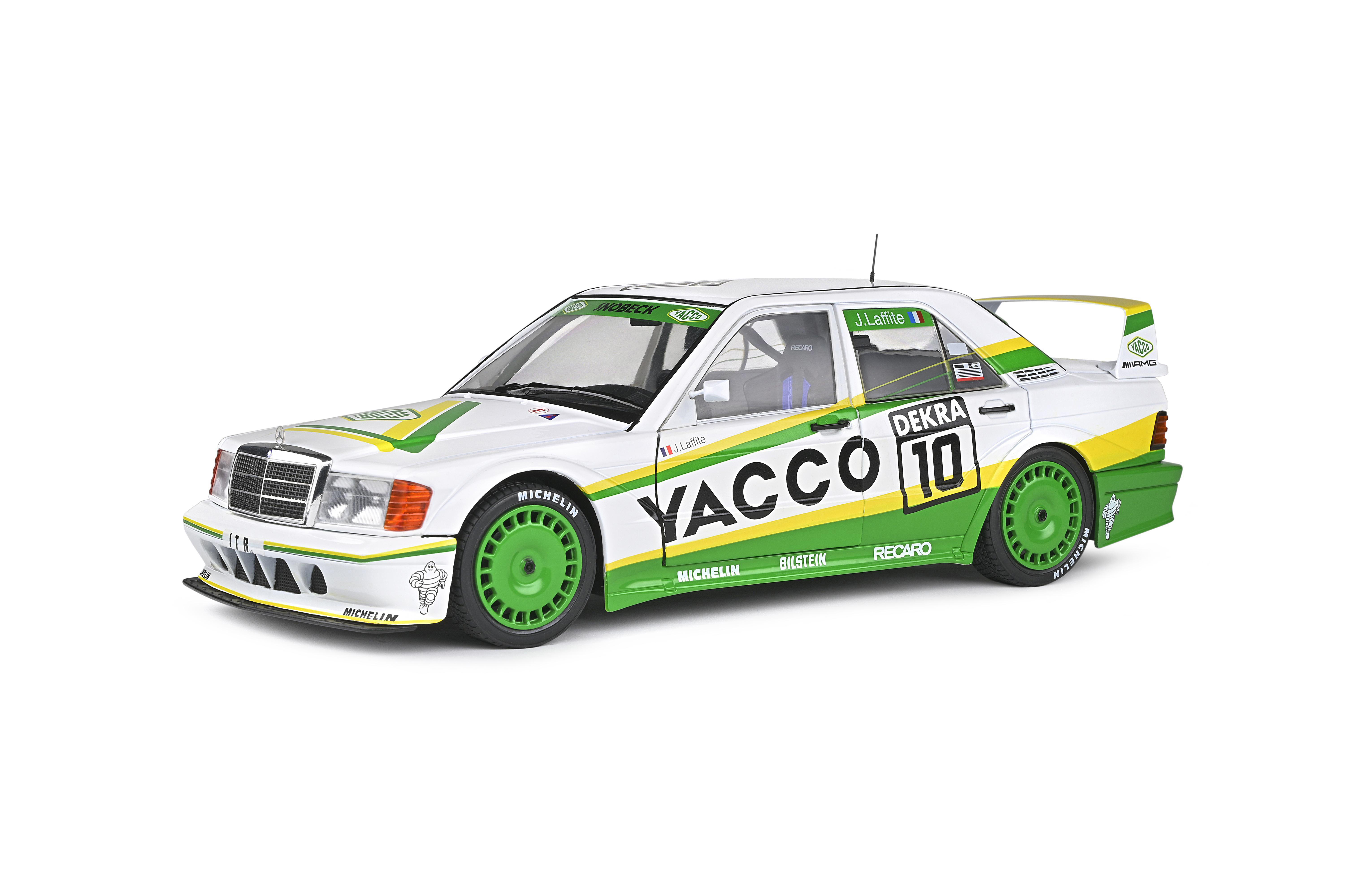 Weißes und grünes Rennauto mit der Nummer 10. 'Yacco' und 'Dekra' sind sichtbar.