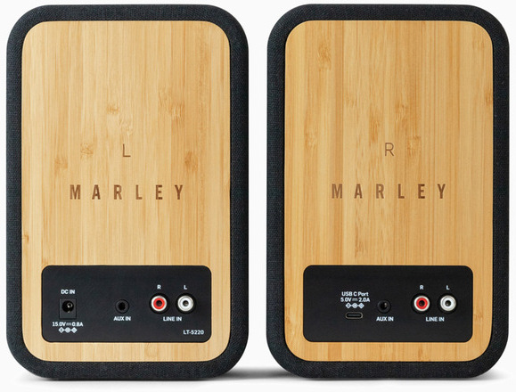 Deux enceintes Marley avec design bambou, étiquetées L et R, avec entrées.