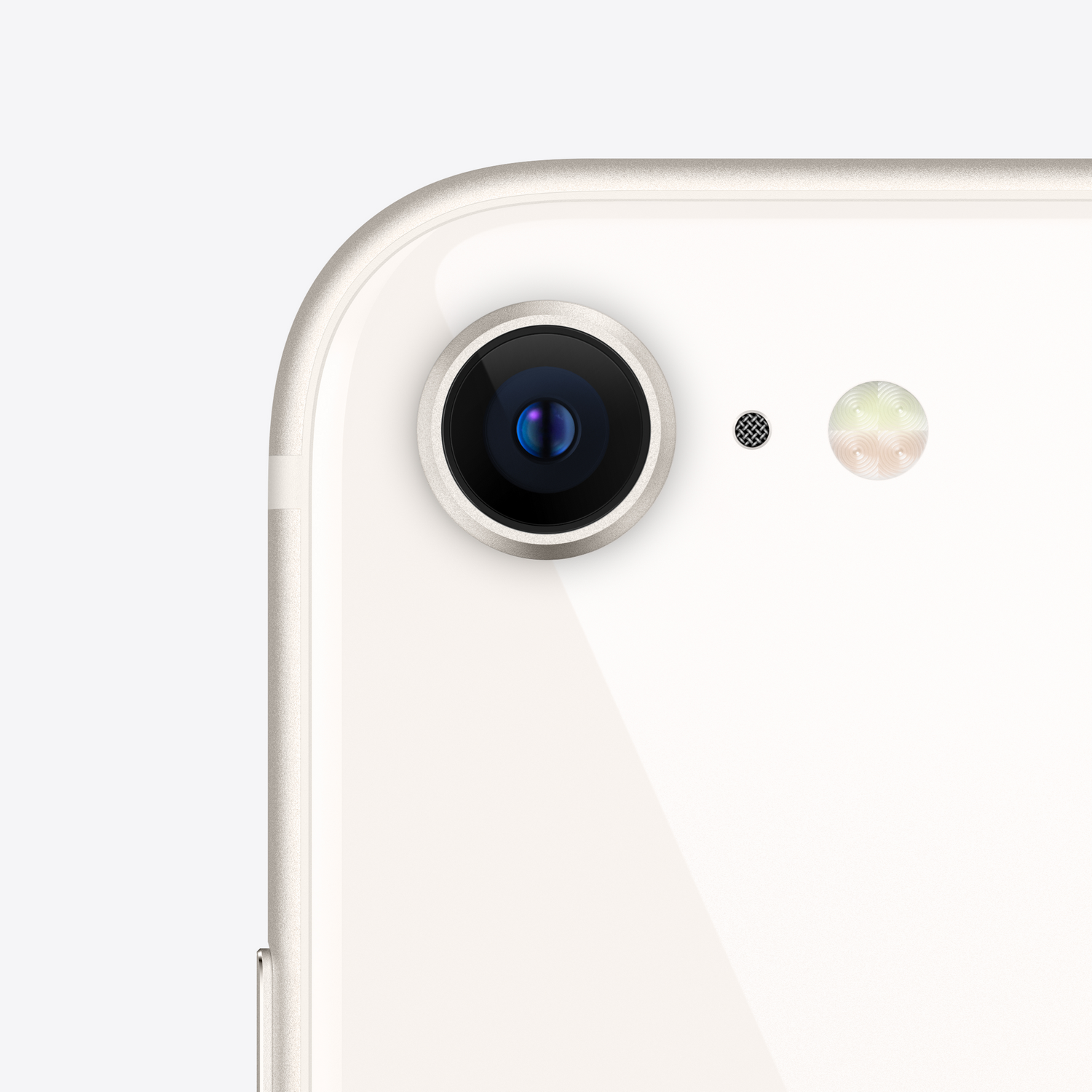 Primer plano de un smartphone blanco con lente de cámara y flash.