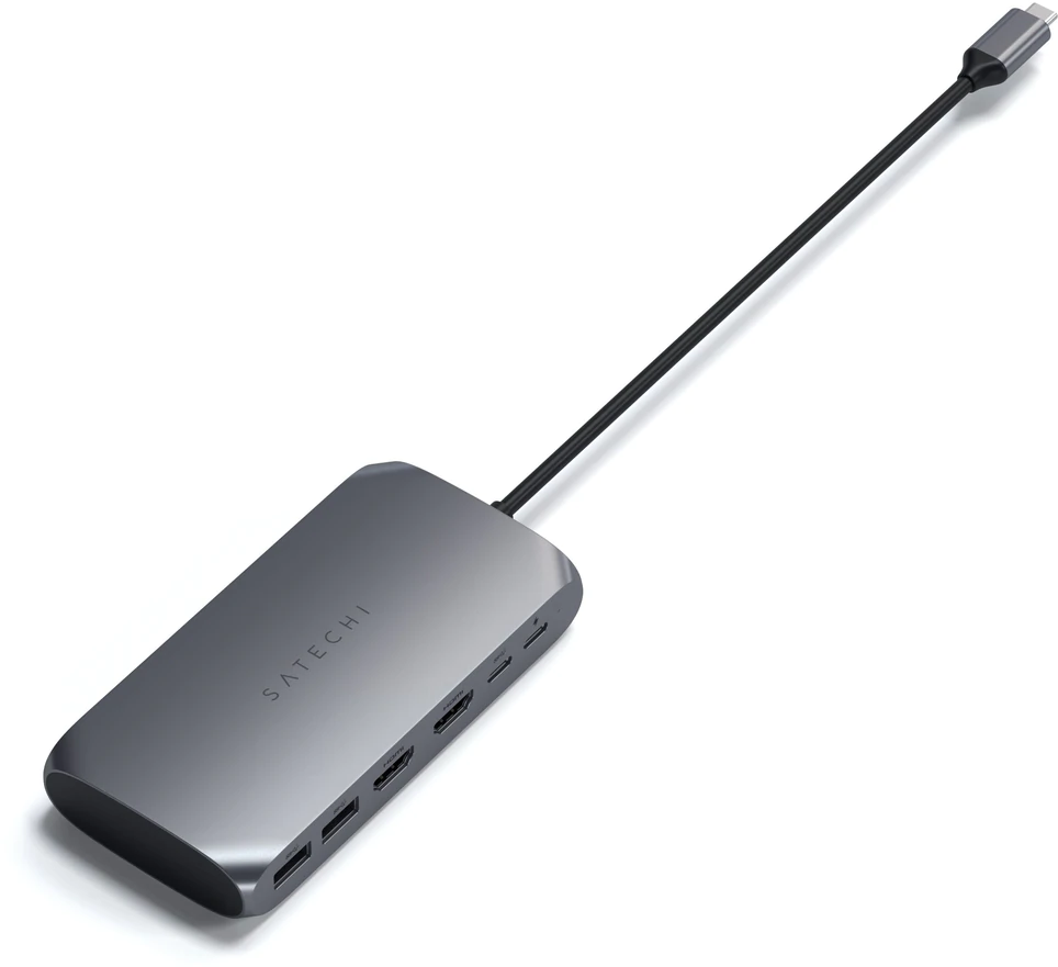 Un adattatore multiporta Satechi grigio con più porte e un cavo USB-C.