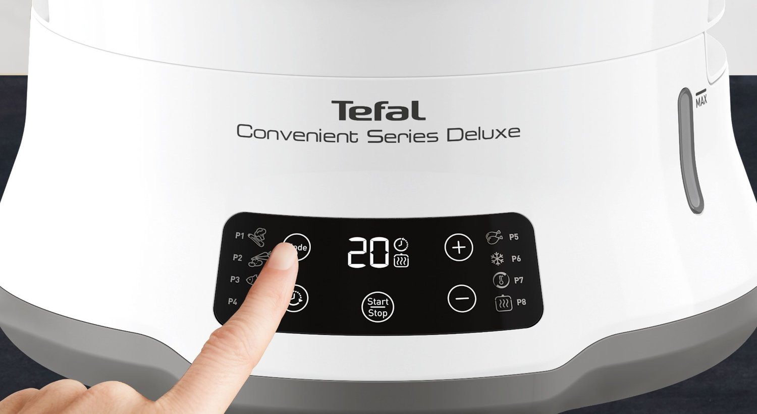 Fehér Tefal készülék vezérlőpanel, ujj a mód gombot érinti.