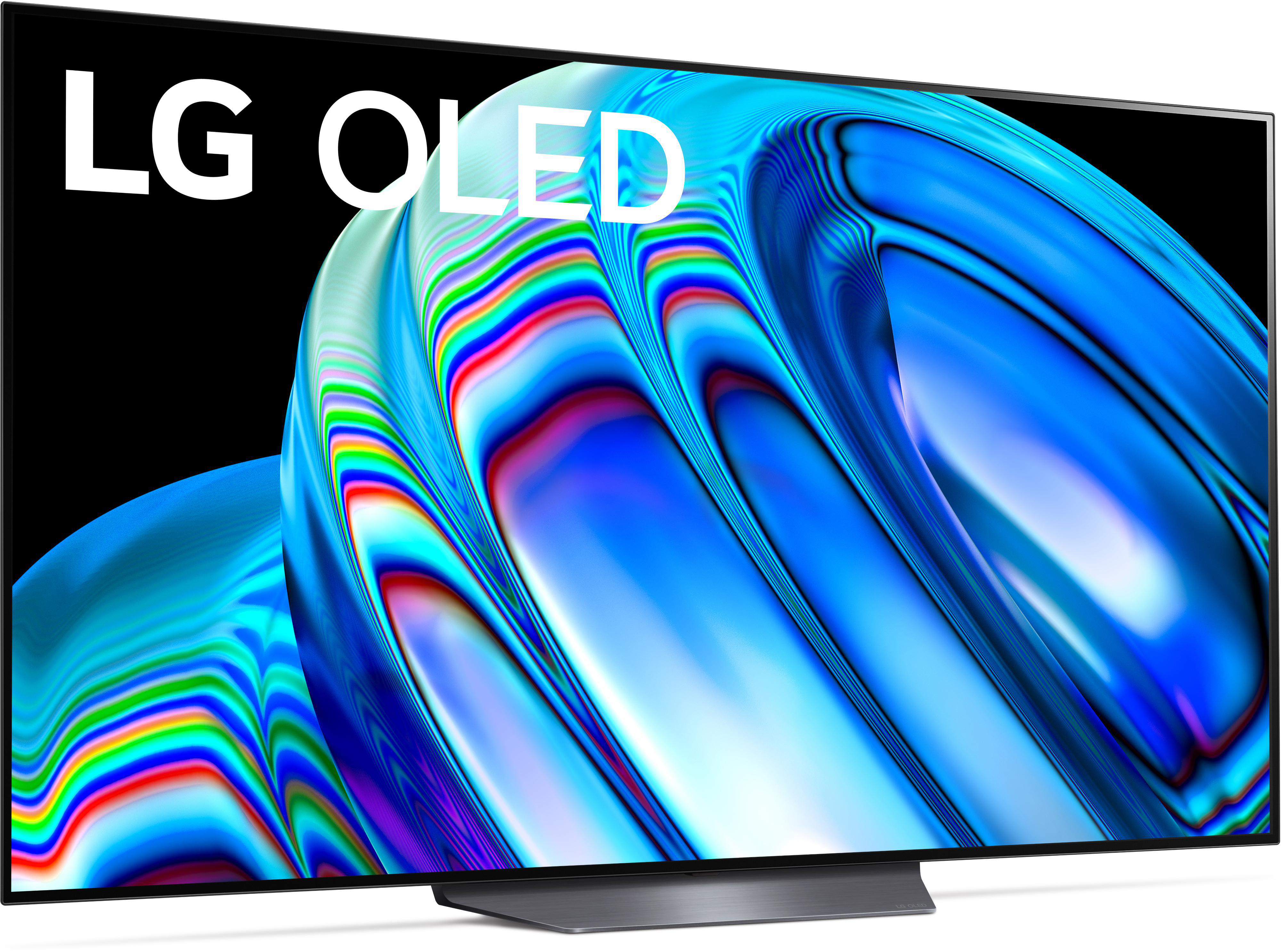 LG OLED-Fernseher mit einem lebendigen blau-weißen abstrakten Design auf dem Bildschirm. Er hat einen silbernen Ständer.