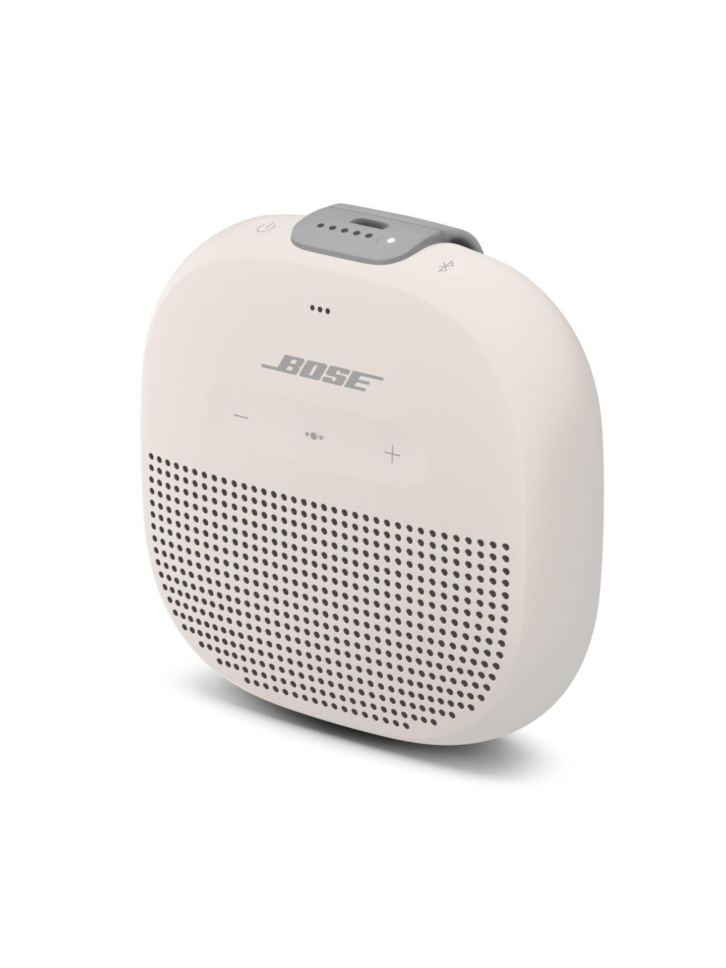 Bose-Lautsprecher, weiß, mit Knöpfen und einem Grill.