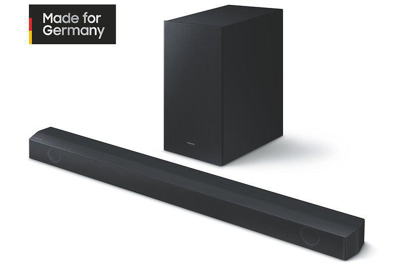 Schwarze Soundbar und Subwoofer, mit dem Text 'Made for Germany'.