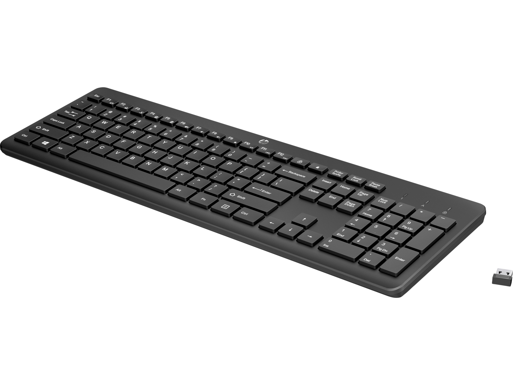 Teclado de computadora negro con un receptor USB sobre un fondo negro.