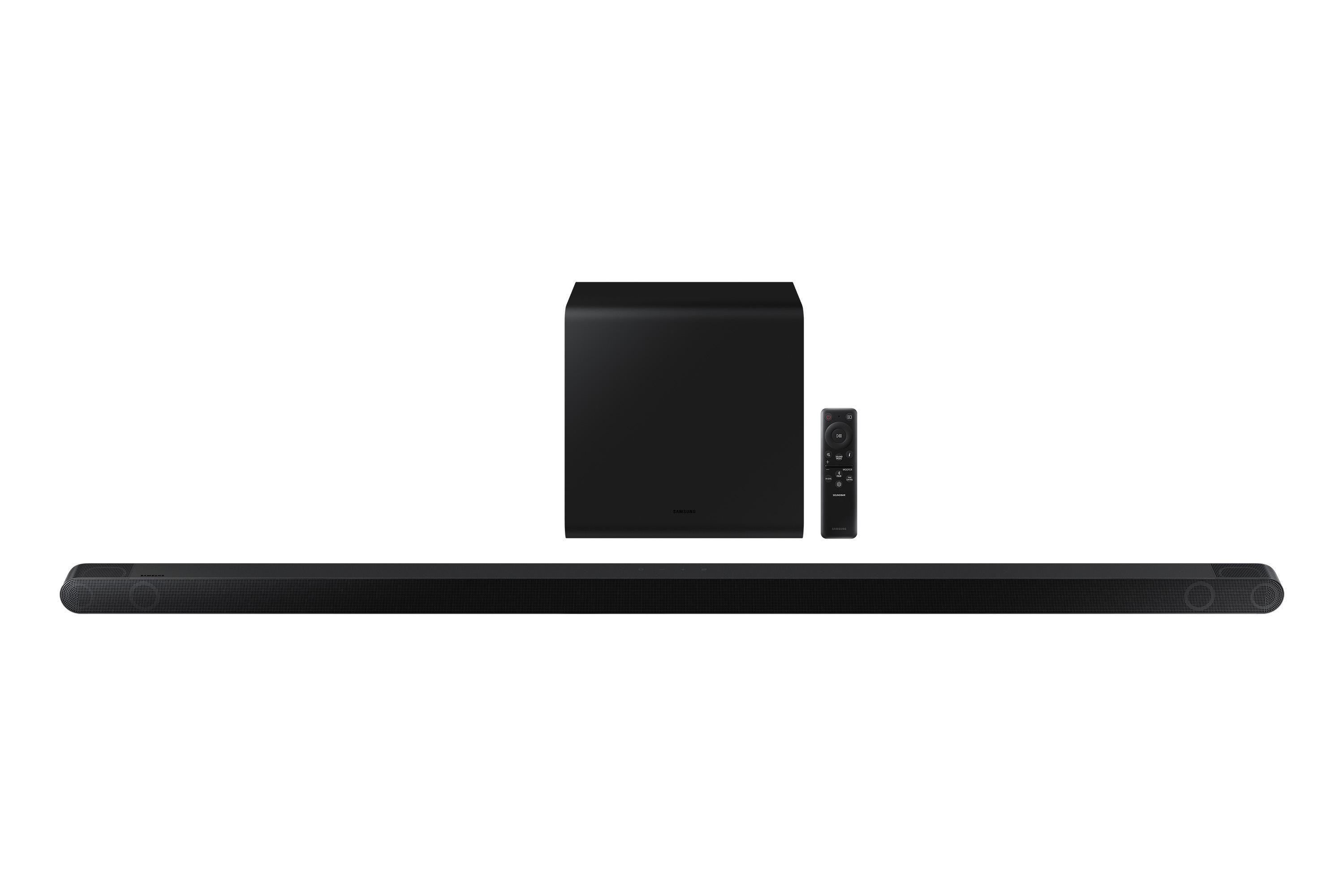 Schwarze Soundbar, Subwoofer und Fernbedienung auf weißem Hintergrund. Modernes Audiosystem.