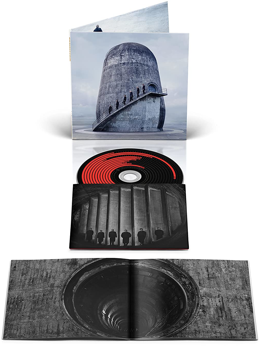Albumkészlet egy toronnyal, egy CD-vel és egy alagútképpel. Fekete-fehér és piros színvilág.
