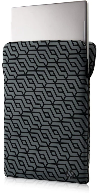 Ordinateur portable dans une housse à motifs gris et noirs. L'étui est droit.