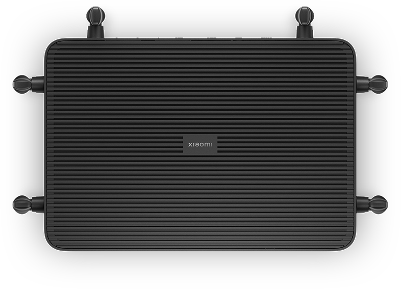Fekete router antennákkal, felülnézet fekete háttérrel.