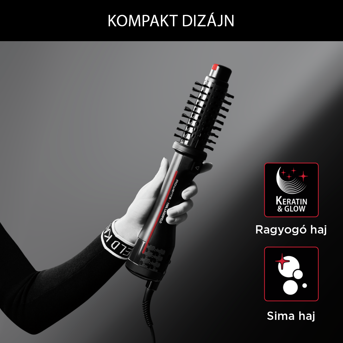 Egy kéz tart egy fekete-piros hajformázó kefét. A jobb oldalon a szöveg: Keratin & Glow és Sima haj.