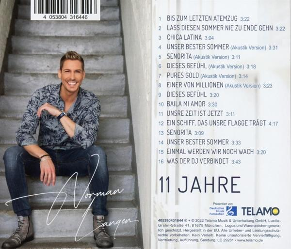 Albumcover. Ein lächelnder Mann in blauem Hemd, das Album heißt '11 Jahre'.