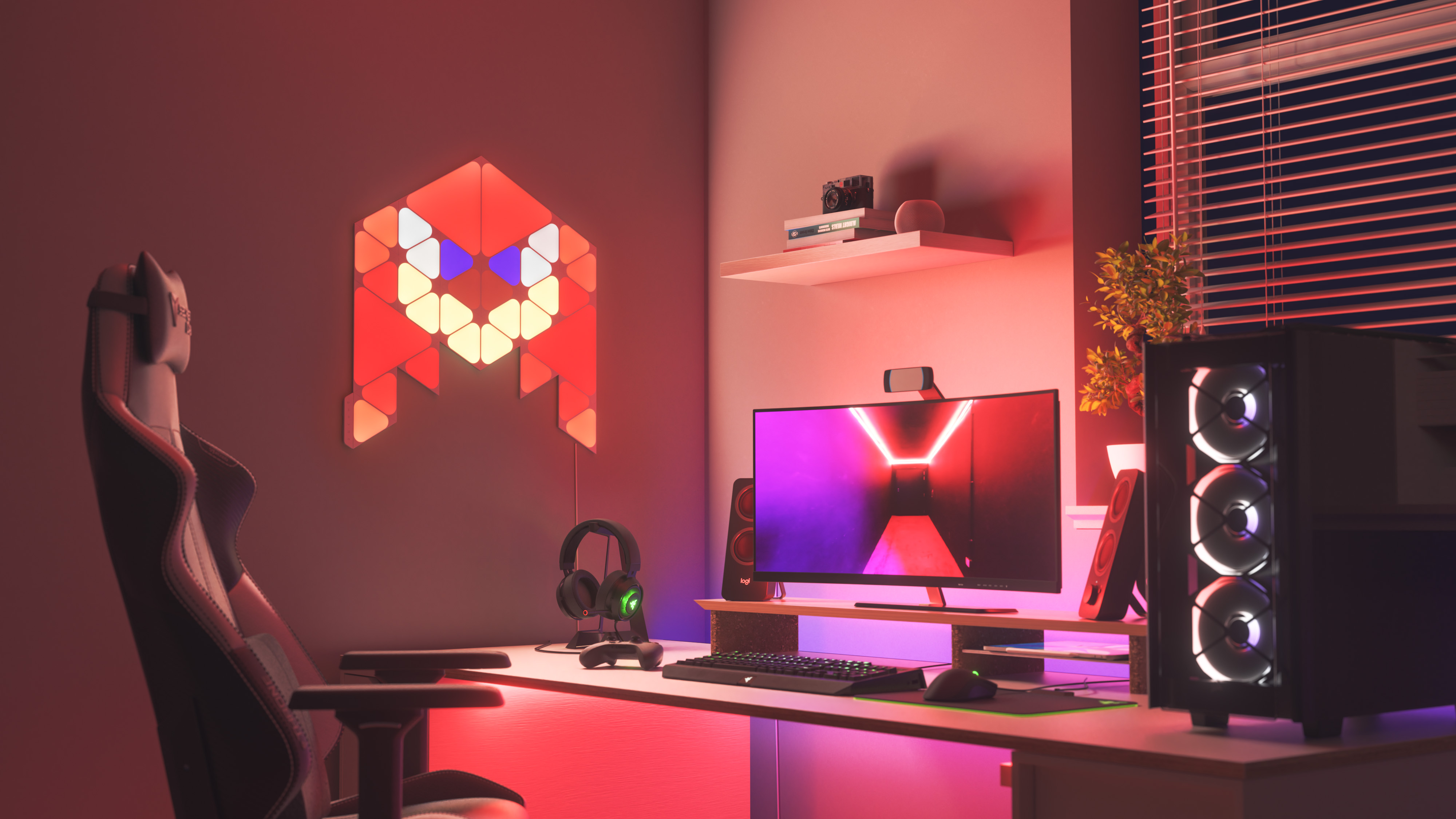 Gaming-Setup. Rotes und weißes Licht, Schreibtisch, Monitor und Gaming-Stuhl.