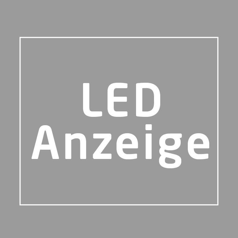 Graues Quadrat mit Text 'LED Anzeige' in weißem Rahmen auf grauem Hintergrund.