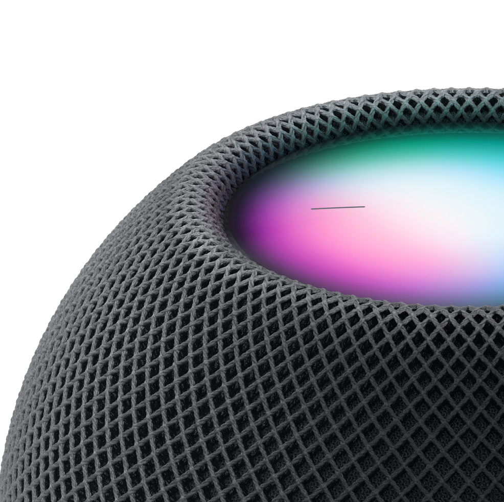 Close-up van een donkergrijze Apple HomePod. Het heeft een mesh-buitenkant en een kleurrijke bovenkant.