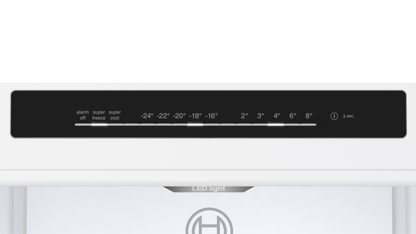 Een close-up van een bedieningspaneel met temperatuurinstellingen en LED-lichtindicatie.