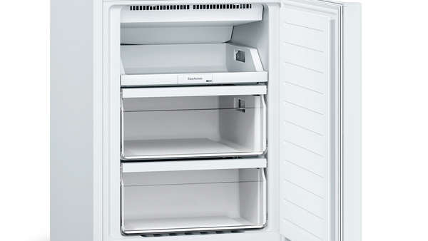 Open white freezer with three drawers visible.