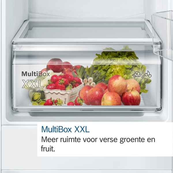A refrigerator drawer filled with fruits and vegetables. The drawer says 'MultiBox XXL'.
