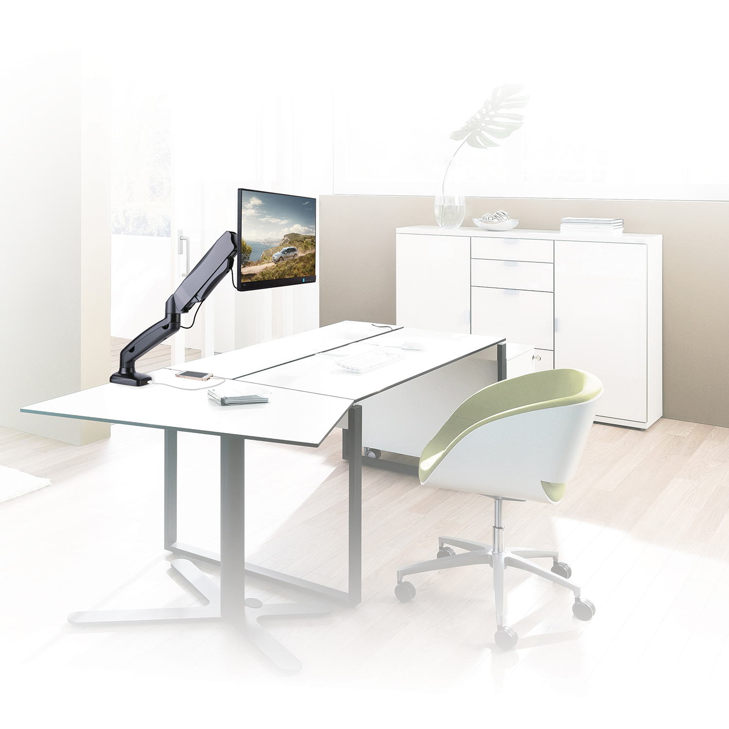 Modern office setup with a monitor on an adjustable arm, white desk, and chair.