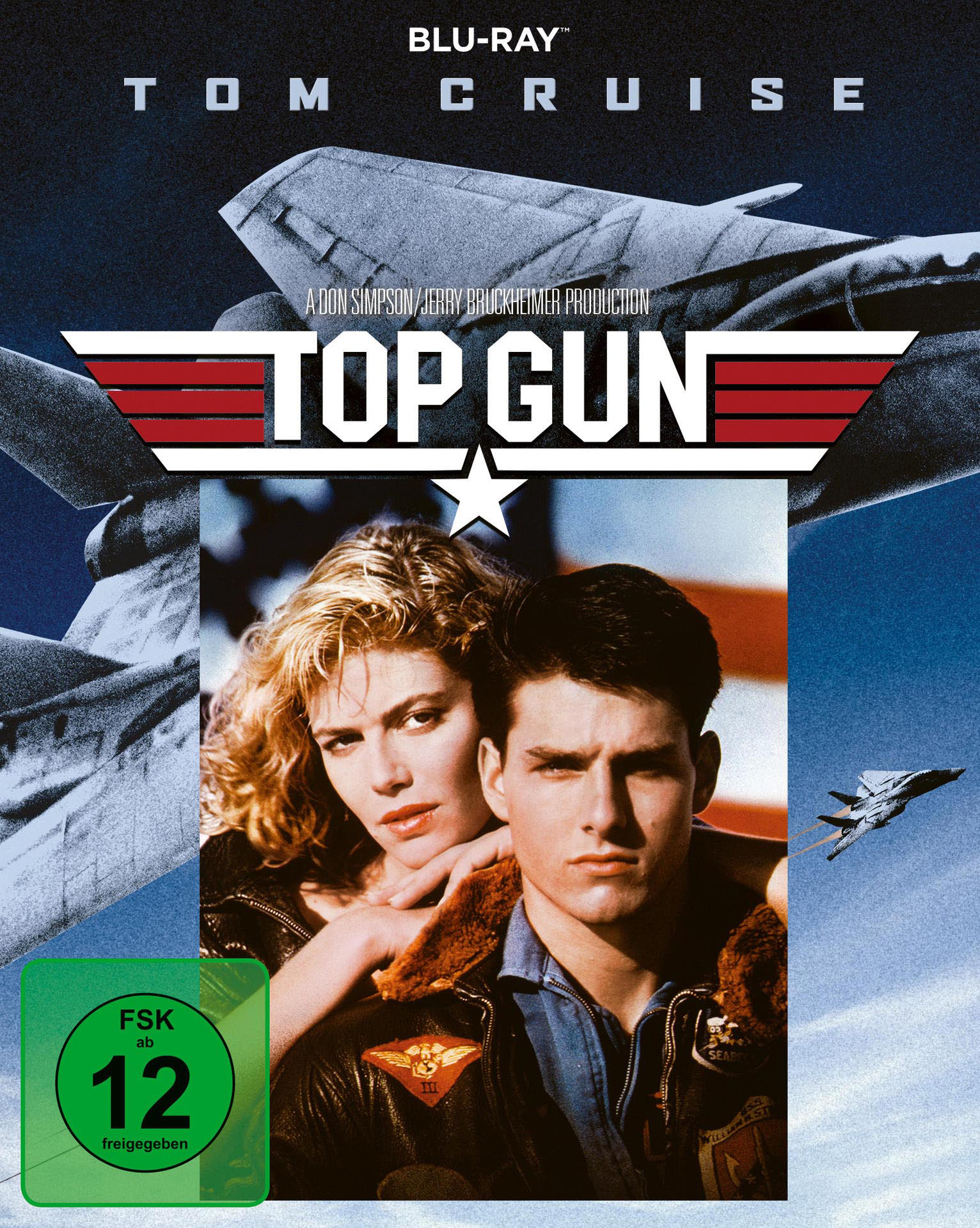 Filmcover von Top Gun. Tom Cruise und eine Frau vor einem Jet. Blauer Himmel im Hintergrund.